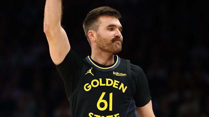 Feb 5, 2026; Phoenix, Arizona, USA; Golden State Warriors guard Pat Spencer (61) celebrates a three point shot against the Phoenix Suns in the first half at Mortgage Matchup Center. Mandatory Credit: Mark J. Rebilas-Imagn Images