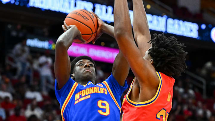 Apr 2, 2024; Houston, TX, USA; McDonald's All American East guard Drake Powell (9) shoots the ball over McDonald's All American West guard Karter Knox (21) during the first half at Toyota Center. Mandatory Credit: Maria Lysaker-Imagn Images Apr 2, 2024; Houston, TX, USA; McDonald's All American East guard Drake Powell (9) shoots the ball over McDonald's All American West guard Karter Knox (21) during the first half at Toyota Center. Mandatory Credit: Maria Lysaker-Imagn Images