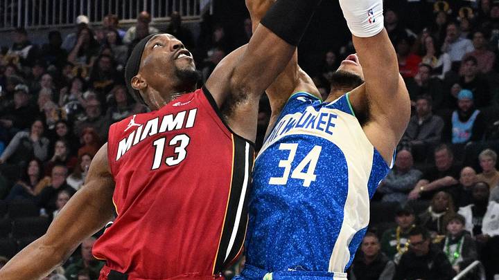 Feb 13, 2024; Milwaukee, Wisconsin, USA; Milwaukee Bucks forward Giannis Antetokounmpo (34) and Miami Heat center Bam Adebayo (13) battle for a rebound in the first half at Fiserv Forum. Mandatory Credit: Michael McLoone-Imagn Images Feb 13, 2024; Milwaukee, Wisconsin, USA; Milwaukee Bucks forward Giannis Antetokounmpo (34) and Miami Heat center Bam Adebayo (13) battle for a rebound in the first half at Fiserv Forum. Mandatory Credit: Michael McLoone-Imagn Images