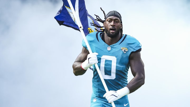 Nov 16, 2025; Jacksonville, Florida, USA; Jacksonville Jaguars linebacker Devin Lloyd (0) participates in pregame player introductions against the Los Angeles Chargers at EverBank Stadium. Mandatory Credit: Nathan Ray Seebeck-Imagn Images