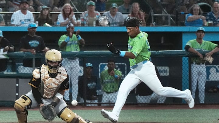 Daytona's Carlos Sanchez (33) scores a run as Bradenton's catcher waits for the throw, Friday, April 4, 2025 at Jackie Robinson Ballpark in Daytona Beach. Daytona's Carlos Sanchez (33) scores a run as Bradenton's catcher waits for the throw, Friday, April 4, 2025 at Jackie Robinson Ballpark in Daytona Beach.