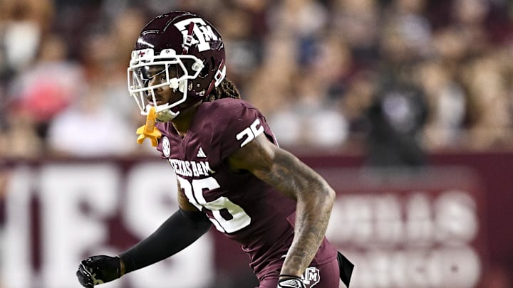 Nov 16, 2024; College Station, Texas, USA; Texas A&M Aggies defensive back Will Lee III (26) defends in coverage against the New Mexico State Aggies during the first half at Kyle Field. Mandatory Credit: Maria Lysaker-Imagn Images 