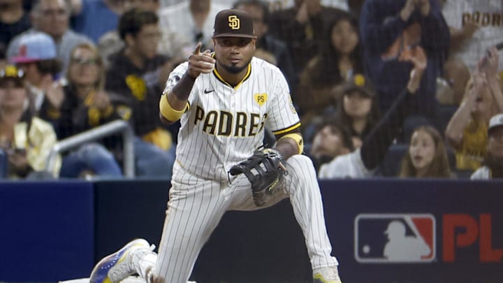 Oct 8, 2024; San Diego, California, USA; San Diego Padres first baseman Luis Arraez (4) reacts after an out in the sixth inning against the Los Angeles Dodgers during game three of the NLDS for the 2024 MLB Playoffs at Petco Park. Mandatory Credit: David Frerker-Imagn Images Oct 8, 2024; San Diego, California, USA; San Diego Padres first baseman Luis Arraez (4) reacts after an out in the sixth inning against the Los Angeles Dodgers during game three of the NLDS for the 2024 MLB Playoffs at Petco Park. Mandatory Credit: David Frerker-Imagn Images