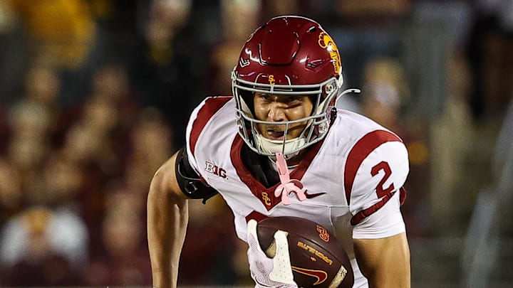 Oct 5, 2024; Minneapolis, Minnesota, USA; USC Trojans wide receiver Duce Robinson (2) runs after a catch against the Minnesota Golden Gophers during the first half at Huntington Bank Stadium. Mandatory Credit: Matt Krohn-Imagn Images