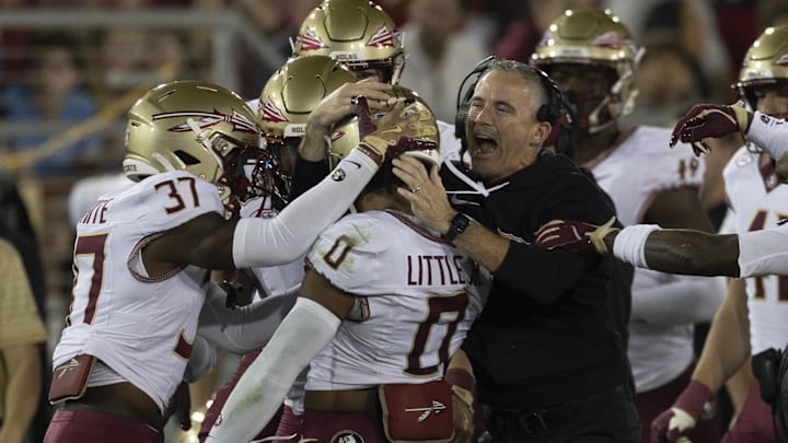 Oct 18, 2025; Stanford, California, USA;  Florida State Seminoles head coach Mike Norvell celebrates with defensive back Earl Little Jr. (0) during the first quarter against the Stanford Cardinal at Stanford Stadium. Mandatory Credit: Stan Szeto-Imagn Images