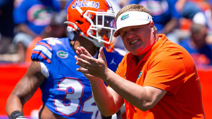 Florida Gators defensive coordinator Austin Armstrong cheers on his team during warm up before the Orange and Blue game at Ben Hill Griffin Stadium in Gainesville, FL on Saturday, April 13, 2024 [Doug Engle/Gainesville Sun]2024