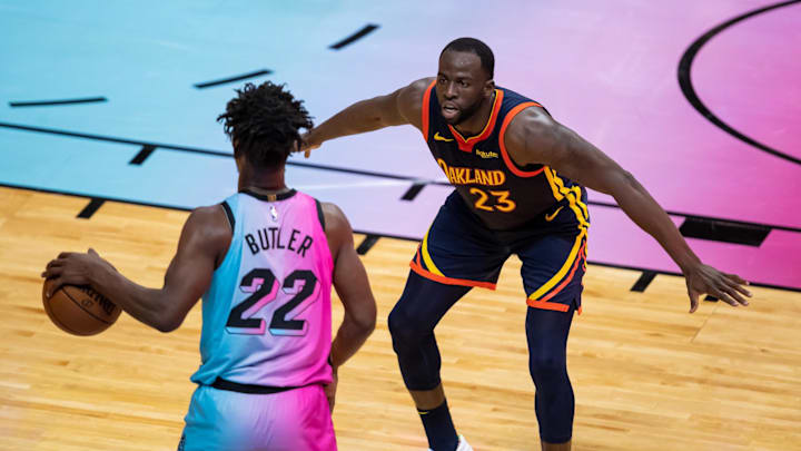 Apr 1, 2021; Miami, Florida, USA; Golden State Warriors forward Draymond Green (23) guards Miami Heat forward Jimmy Butler (22) during the third quarter of a game at American Airlines Arena. Mandatory Credit: Mary Holt-Imagn Images Apr 1, 2021; Miami, Florida, USA; Golden State Warriors forward Draymond Green (23) guards Miami Heat forward Jimmy Butler (22) during the third quarter of a game at American Airlines Arena. Mandatory Credit: Mary Holt-Imagn Images