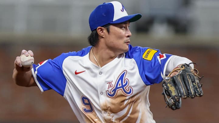 Atlanta Braves shortstop Ha-Seong Kim (9) throws the ball to first base for an out against the Pittsburgh Pirates during the seventh inning at Truist Park.