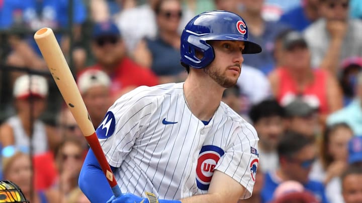 Aug 16, 2025; Chicago, Illinois, USA; Chicago Cubs right fielder Kyle Tucker (30) hits a single during the eighth inning against the Pittsburgh Pirates at Wrigley Field. Mandatory Credit: Patrick Gorski-Imagn Images