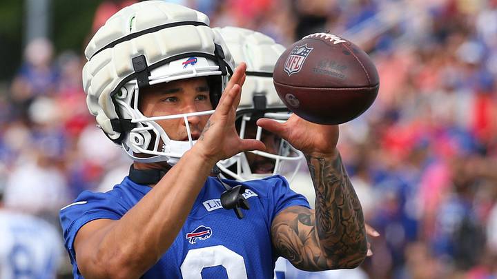 Bills defensive back Taylor Rapp pulls in a throw as he warms up.