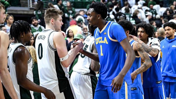 Michigan State's Jaxon Kohler, left, shakes hands with former teammate UCLA's Xavier Booker after the game on Tuesday, Feb. 17, 2026, at the Breslin Center in East Lansing. Michigan State's Jaxon Kohler, left, shakes hands with former teammate UCLA's Xavier Booker after the game on Tuesday, Feb. 17, 2026, at the Breslin Center in East Lansing.