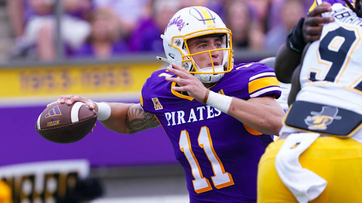 Sep 14, 2024; Greenville, North Carolina, USA;  East Carolina Pirates quarterback Jake Garcia (11) throws the ball against the Appalachian State Mountaineers during the first half at Dowdy-Ficklen Stadium. Mandatory Credit: James Guillory-Imagn Images