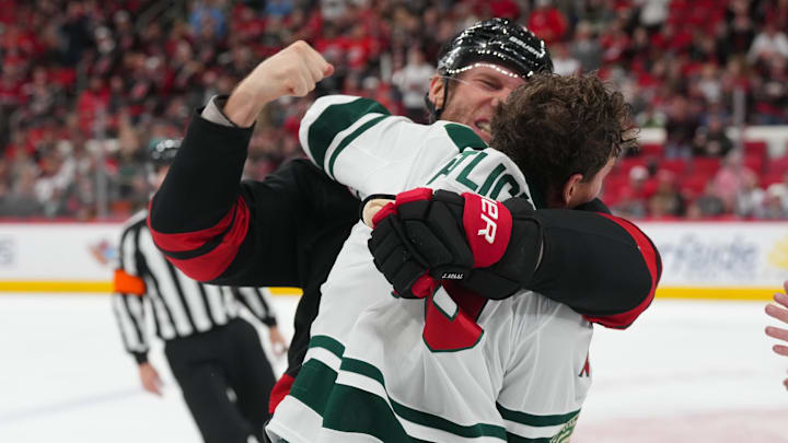 Nov 6, 2025; Raleigh, North Carolina, USA; Carolina Hurricanes center Jordan Staal (11) fights Minnesota Wild center Tyler Pitlick (19) during the first period at Lenovo Center. Mandatory Credit: James Guillory-Imagn Images Nov 6, 2025; Raleigh, North Carolina, USA; Carolina Hurricanes center Jordan Staal (11) fights Minnesota Wild center Tyler Pitlick (19) during the first period at Lenovo Center. Mandatory Credit: James Guillory-Imagn Images