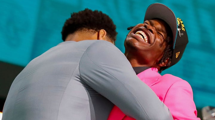 Wide receiver and cornerback Travis Hunter hugs Jacksonville Jaguars defensive lineman Arik Armstead after the Jaguars select Hunter second overall during the first round of the 2025 NFL Draft on Thursday, April 24, 2025, at Lambeau Field in Green Bay, Wisconsin. The draft runs through April 26.
Tork Mason/USA TODAY NETWORK-Wisconsin