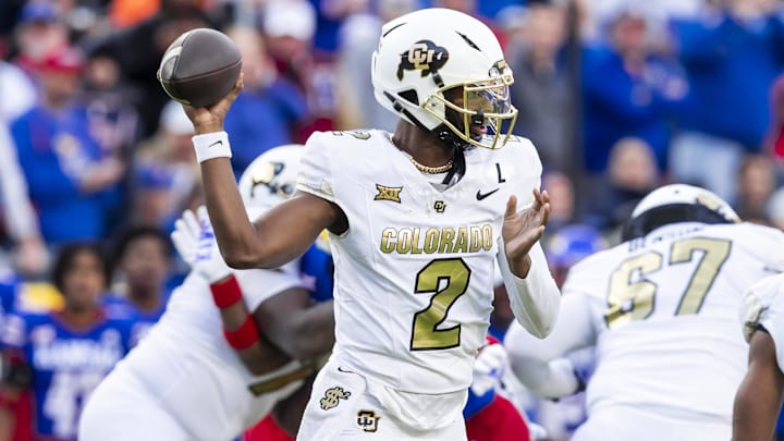 Nov 23, 2024; Kansas City, Missouri, USA; Colorado quarterback Shedeur Sanders (2) passes the ball during the 2nd quarter between the Kansas Jayhawks and the Colorado Buffaloes at GEHA Field at Arrowhead Stadium. Nov 23, 2024; Kansas City, Missouri, USA; Colorado quarterback Shedeur Sanders (2) passes the ball during the 2nd quarter between the Kansas Jayhawks and the Colorado Buffaloes at GEHA Field at Arrowhead Stadium.
