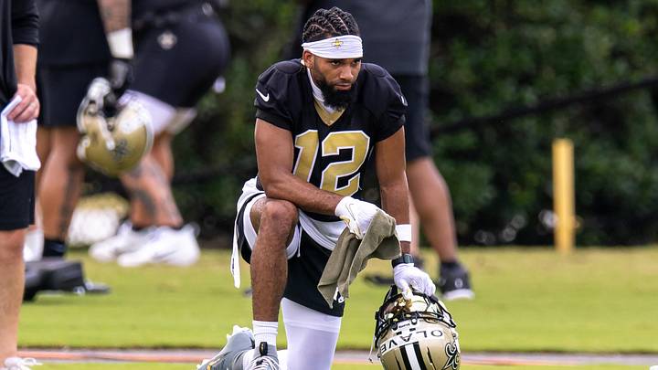 Jun 10, 2025; New Orleans, LA, USA;  New Orleans Saints wide receiver Chris Olave (12) looks on during minicamp at Ochsner Sports Performance Center. Mandatory Credit: Stephen Lew-Imagn Images