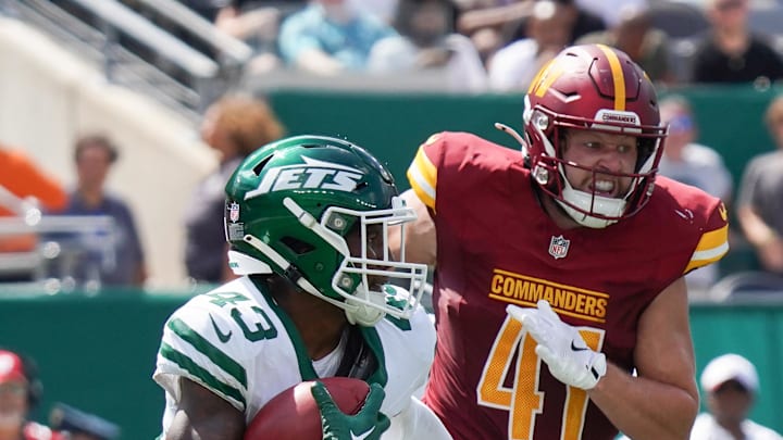 Aug 10, 2024; East Rutherford, New Jersey, USA; New York Jets defensive back Brandon Codrington (43) returns a punt as Washington Commanders tight end Colson Yankoff (41) during the second half pursues at MetLife Stadium. Mandatory Credit: Lucas Boland-Imagn Images Aug 10, 2024; East Rutherford, New Jersey, USA; New York Jets defensive back Brandon Codrington (43) returns a punt as Washington Commanders tight end Colson Yankoff (41) during the second half pursues at MetLife Stadium. Mandatory Credit: Lucas Boland-Imagn Images