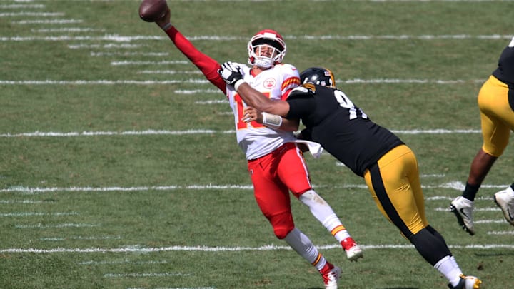 Sep 16, 2018; Pittsburgh, PA, USA;  Pittsburgh Steelers defensive tackle Cameron Heyward (R) pressures Kansas City Chiefs quarterback Patrick Mahomes (15) as he throws during the second quarter at Heinz Field. Mandatory Credit: Charles LeClaire-Imagn Images