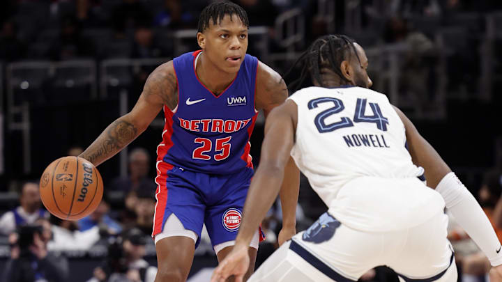 Dec 6, 2023; Detroit, Michigan, USA;  Detroit Pistons guard Marcus Sasser (25) dribbles defended by Jaylen Nowell