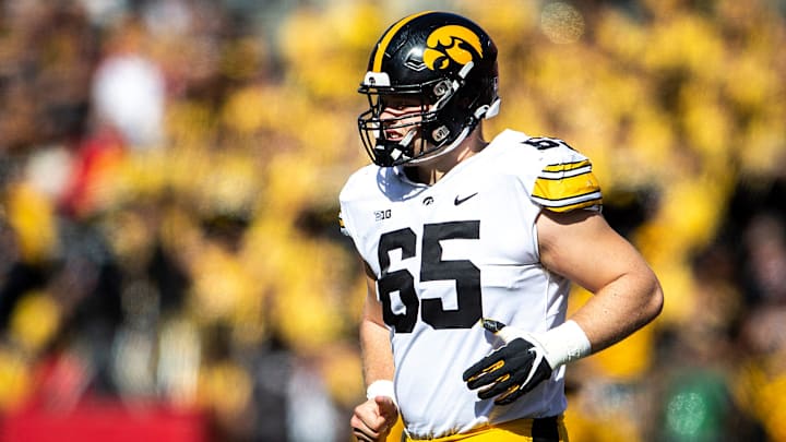 Iowa center Logan Jones (65) runs onto the field during a NCAA football game against Ohio State, Saturday, Oct. 22, 2022, at Ohio Stadium in Columbus, Ohio.

221022 Iowa Ohio St Fb 070 Jpg