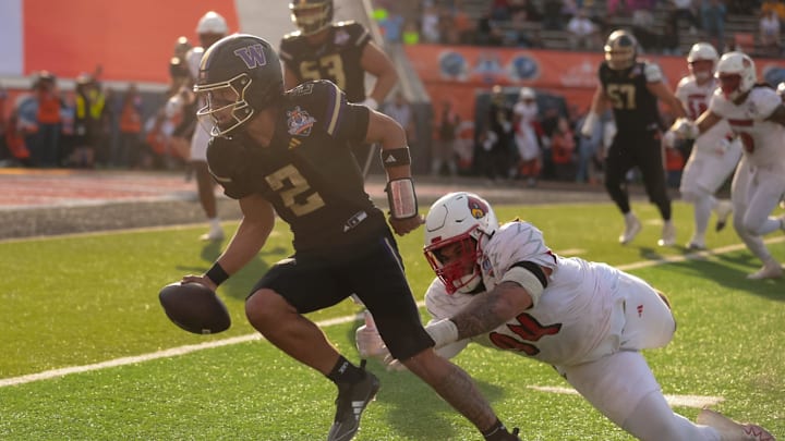 Washington’s Demond Williams Jr. (2) runs the ball during the 91st Tony the Tiger Sun Bowl game against Louisville on Tuesday, Dec. 31, 2024 at the Sun Bowl Stadium in El Paso, Texas.