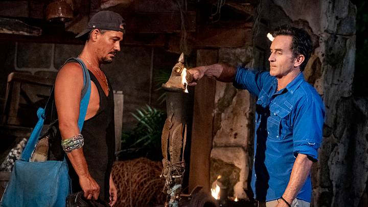"The Buddy System on Steroids" - Jeff Probst extinguishes Boston Rob Mariano's Torch at Tribal Council on the Fifth episode of SURVIVOR: WINNERS AT WAR, airing Wednesday, March 11 (8:00-9:01 PM, ET/PT) on the CBS Television Network. Photo: Robert Voets/CBS Entertainment ©2020 CBS Broadcasting, Inc. All Rights Reserved "The Buddy System on Steroids" - Jeff Probst extinguishes Boston Rob Mariano's Torch at Tribal Council on the Fifth episode of SURVIVOR: WINNERS AT WAR, airing Wednesday, March 11 (8:00-9:01 PM, ET/PT) on the CBS Television Network. Photo: Robert Voets/CBS Entertainment ©2020 CBS Broadcasting, Inc. All Rights Reserved
