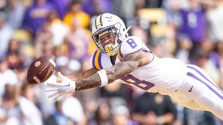 Malik Nabers 8 dives for a ball as the LSU Tigers take on Texas A&M in Tiger Stadium in Baton