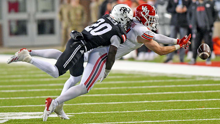Western Kentucky's Noah Meyers attempts to make a catch as Jacksonville State's Travis Franklin Jr. defends during the C-USA Championship at AmFirst Stadium in Jacksonville, Alabama , Alabama December 6, 2024. (Dave Hyatt / Hyatt Media LLC)