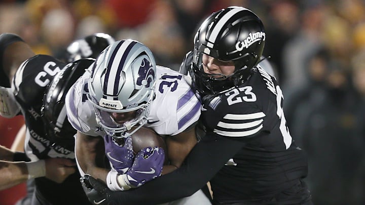 Iowa State Cyclones linebacker Will McLaughlin (23) takes down Kansas State Wildcats running back DJ Giddens (31) during the first quarter in the NCAA football at Jack Trice Stadium on Saturday, Nov. 30, 2024, in Ames, Iowa.