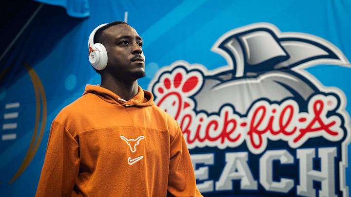 Texas Longhorns running back Quintrevion Wisner (26) walks onto the field as the Texas Longhorns prepare to play the Arizona State Sun Devils in the Peach Bowl College Football Playoff quarterfinal at Mercedes-Benz Stadium in Atlanta, Georgia, Jan. 1, 2025. Texas Longhorns running back Quintrevion Wisner (26) walks onto the field as the Texas Longhorns prepare to play the Arizona State Sun Devils in the Peach Bowl College Football Playoff quarterfinal at Mercedes-Benz Stadium in Atlanta, Georgia, Jan. 1, 2025.