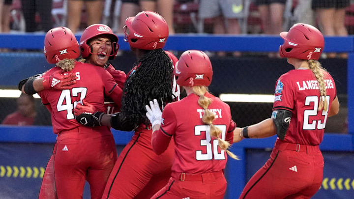 Texas Tech Raiders celebrate their defeat of the Oklahoma Sooners at Devon Park in Oklahoma City, Monday, June, 2, 2025. Texas Tech Raiders celebrate their defeat of the Oklahoma Sooners at Devon Park in Oklahoma City, Monday, June, 2, 2025.