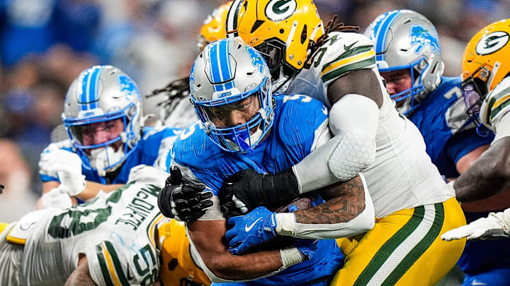 Detroit Lions running back David Montgomery (5) runs for a first down against Green Bay Packers on Thursday.