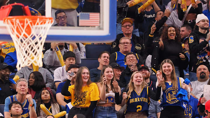 Golden State Warriors fans during a timeout against the Atlanta Hawks at Chase Center. 