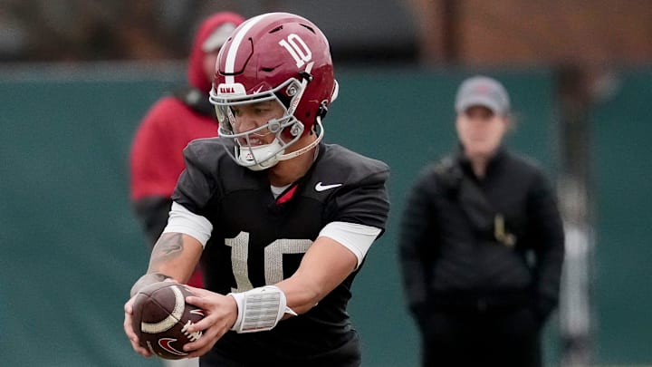 Mar 5, 2025; Tuscaloosa, AL, USA; Quarterback Austin Mack (10) runs a drill during Spring Practice for the Crimson Tide.