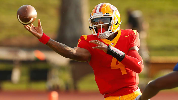 Clarke Central's Hezekiah Millender (4) throws a pass during a GHSA high school football game against Cedar Shoals in Athens, Ga., on Thursday, Aug. 15, 2024.