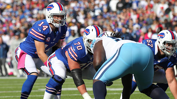 Buffalo Bills quarterback Ryan Fitzpatrick under center Eric Wood