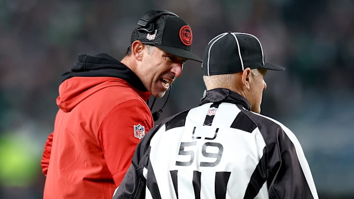 San Francisco 49ers head coach Kyle Shanahan speaks with NFL official Rusty Baynes