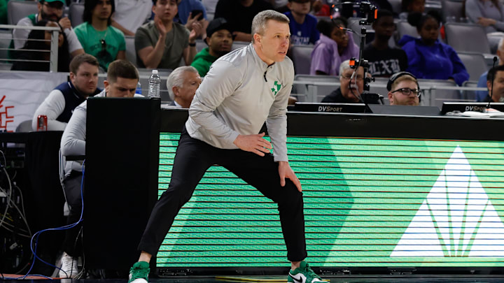 Mar 15, 2025; Fort Worth, TX, USA;  North Texas Mean Green head coach Ross Hodge reacts against the UAB Blazers during the first half at Dickies Arena. Mandatory Credit: Chris Jones-Imagn Images