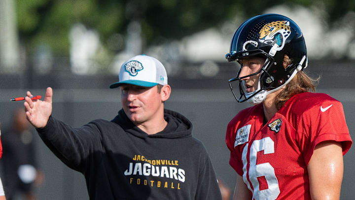 Jaguars Offensive Coordinator Grant Udinski talks with Jacksonville Jaguars quarterback Trevor Lawrence (16) during the Jaguars 14th NFL training camp session at Miller Electric Center Tuesday August 12, 2025 in Jacksonville, Fla. The Jaguars travel to New Orleans to play the Saints this Sunday in their second preseason game. [Doug Engle/Florida Times-Union]