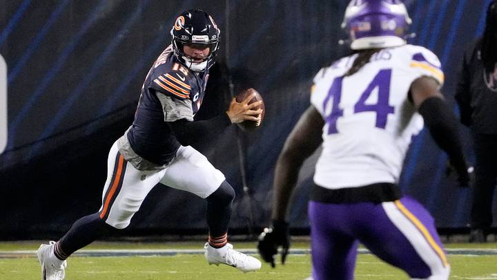 Caleb Williams looks downfield as he runs out of the pocket against the Vikings in last year's season opener. Caleb Williams looks downfield as he runs out of the pocket against the Vikings in last year's season opener.