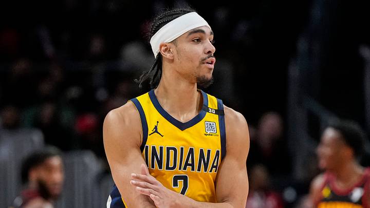 Jan 12, 2024; Atlanta, Georgia, USA; Indiana Pacers guard Andrew Nembhard (2) reacts after making a three point shot against the Atlanta Hawks during the second half at State Farm Arena. Mandatory Credit: Dale Zanine-USA TODAY Sports