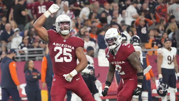 Arizona Cardinals linebacker Zaven Collins (25) celebrates a sack with linebacker Mack Wilson Sr. (2) against the Chicago Bears during the fourth quarter at State Farm Stadium on Nov 3, 2024, in Glendale.