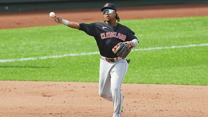 Sep 2, 2024; Kansas City, Missouri, USA; Cleveland Guardians third baseman Jose Ramirez (11) throws to first base during the fourth inning against the Kansas City Royals at Kauffman Stadium. Mandatory Credit: Jay Biggerstaff-Imagn Images
