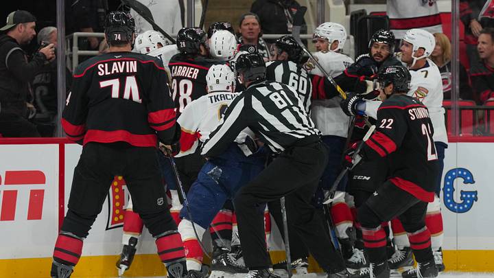 Sep 29, 2026; Raleigh, North Carolina, USA;  Florida Panthers and Carolina Hurricanes scuffle after a play during the second period at Lenovo Center.  Mandatory Credit: James Guillory-Imagn Images