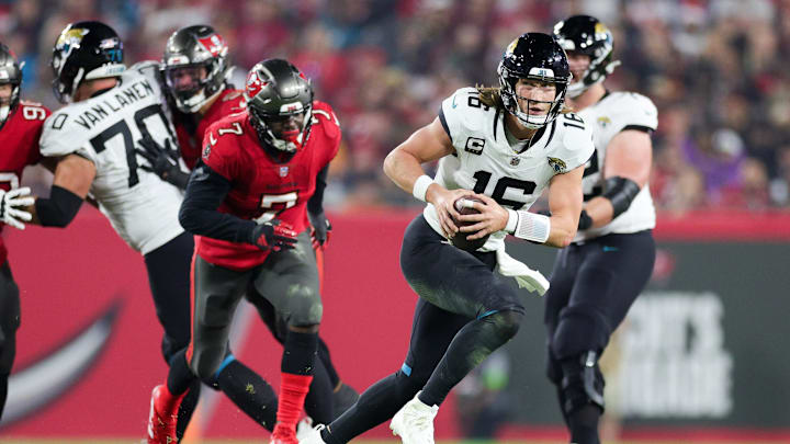 Dec 24, 2023; Tampa, Florida, USA;  Jacksonville Jaguars quarterback Trevor Lawrence (16) runs with