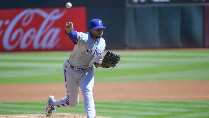 Sep 26, 2024; Oakland, California, USA; Texas Rangers pitcher Kumar Rocker (80) throws a pitch during the first inning against the Oakland Athletics at Oakland-Alameda County Coliseum. 