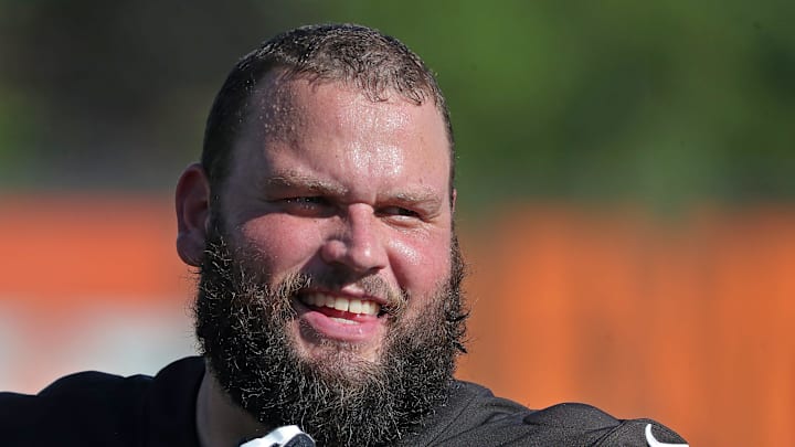 Browns guard Joel Bitonio heads in after practice July 23, 2025.
