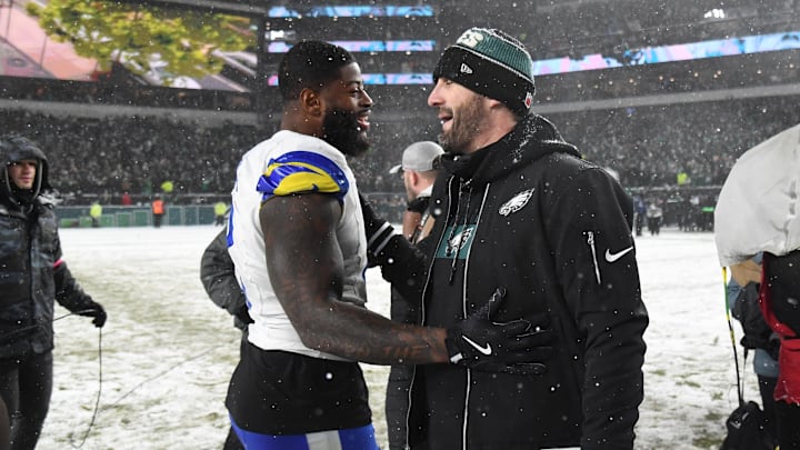Jan 19, 2025; Philadelphia, Pennsylvania, USA; Los Angeles Rams linebacker Jared Verse (8) greets Philadelphia Eagles head coach Nick Sirianni (right) after the 2025 NFC divisional round game at Lincoln Financial Field. Mandatory Credit: Eric Hartline-Imagn Images