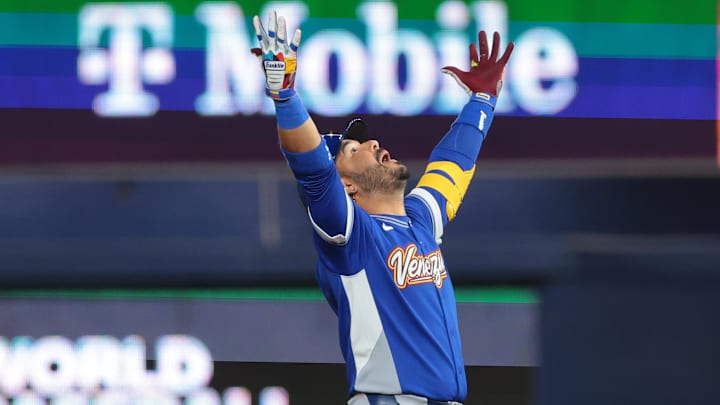 Venezuela third baseman Eugenio Suarez (7) reacts