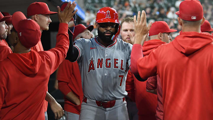 Aug 27, 2024; Detroit, Michigan, USA; Los Angeles Angels right fielder Jo Adell (7) celebrates in the dugout after scoring a run against the Detroit Tigers in the fifth inning at Comerica Park. Mandatory Credit: Lon Horwedel-Imagn Images